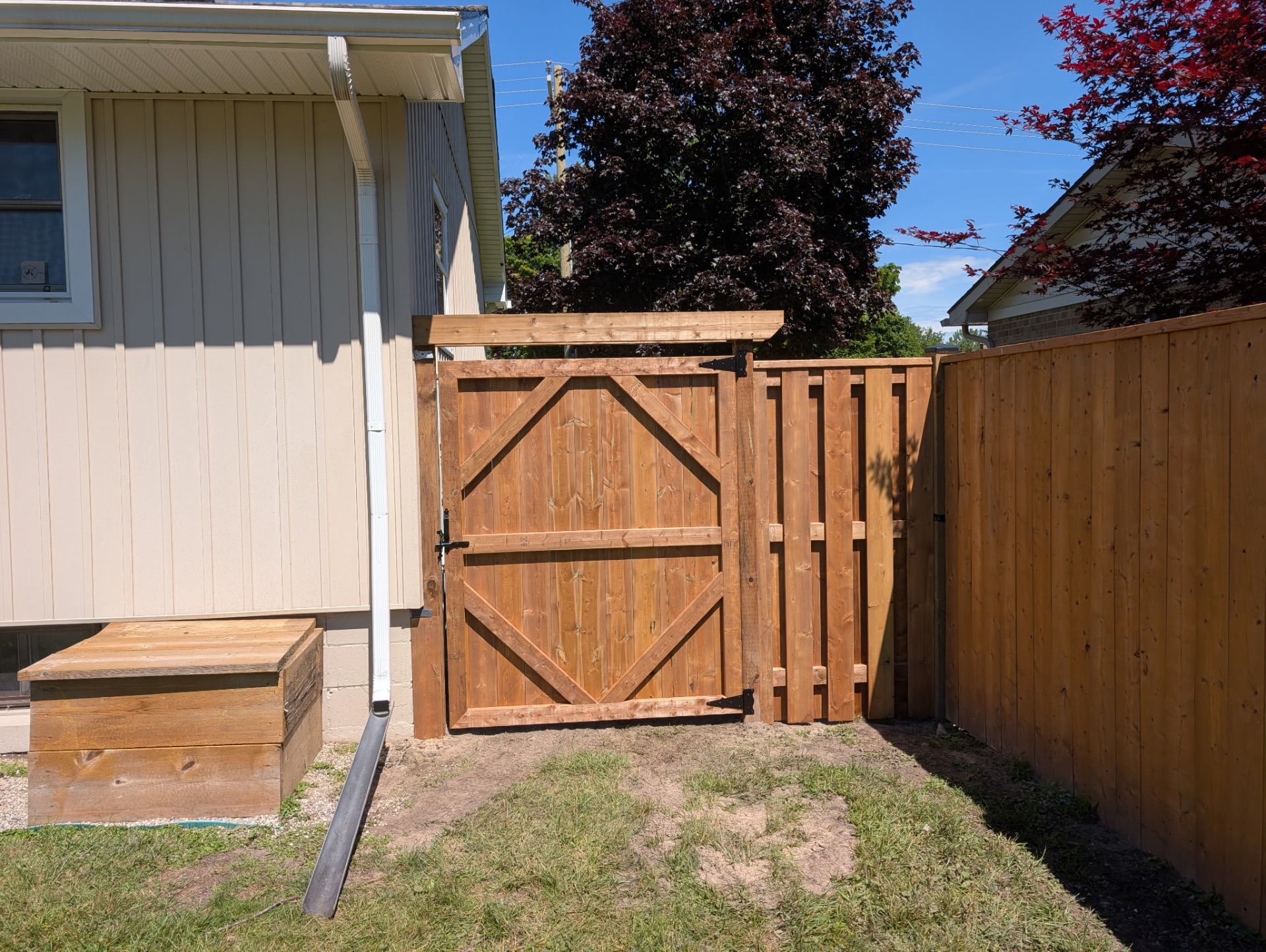 Cedar privacy fence with custom gate